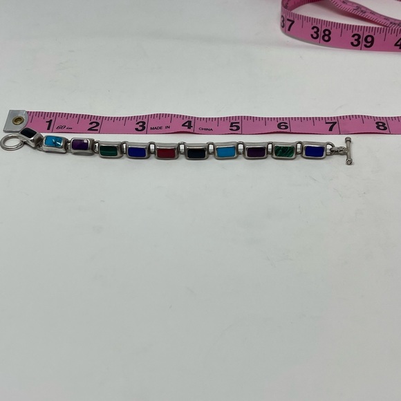Silpada Multi-colored bracelet with toggle clasp.